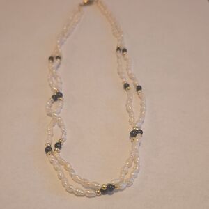 Elegant Pearl and Black Bead Necklace